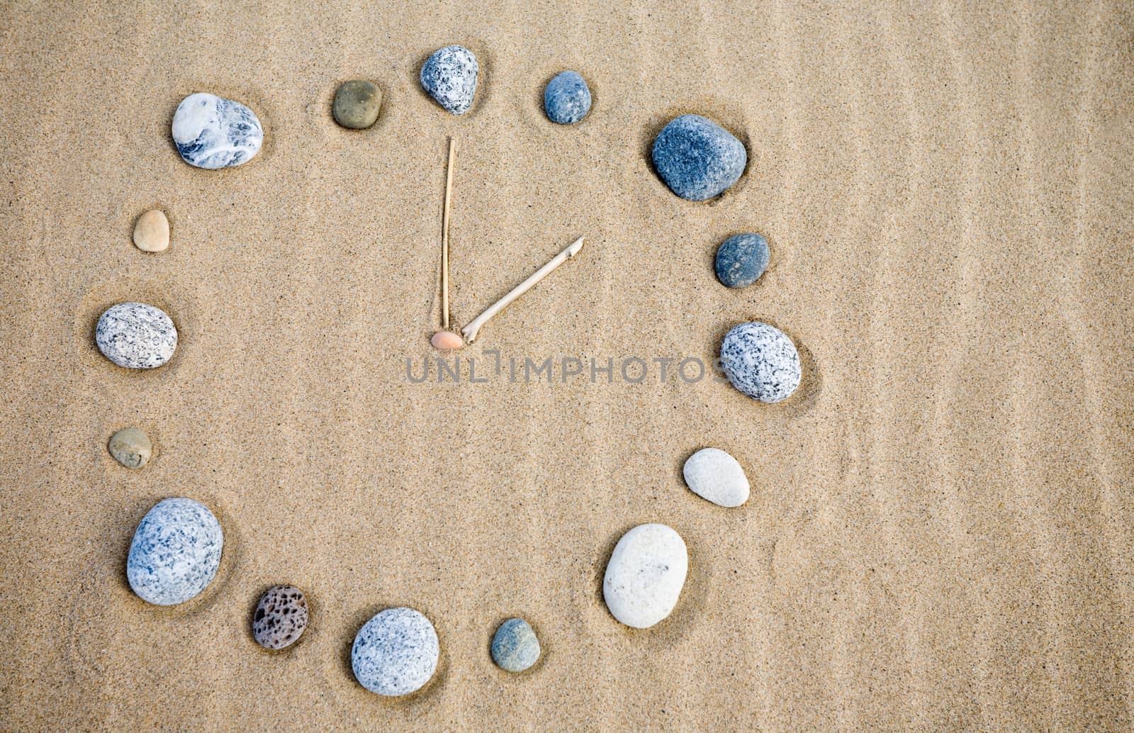 Natural watch on a sand