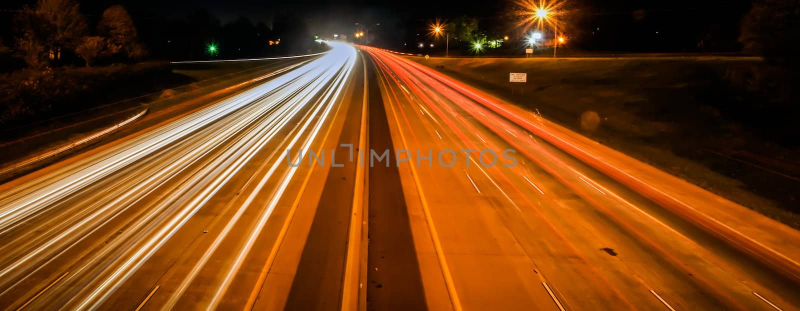 standing in car on side of the road at night in the city by digidreamgrafix