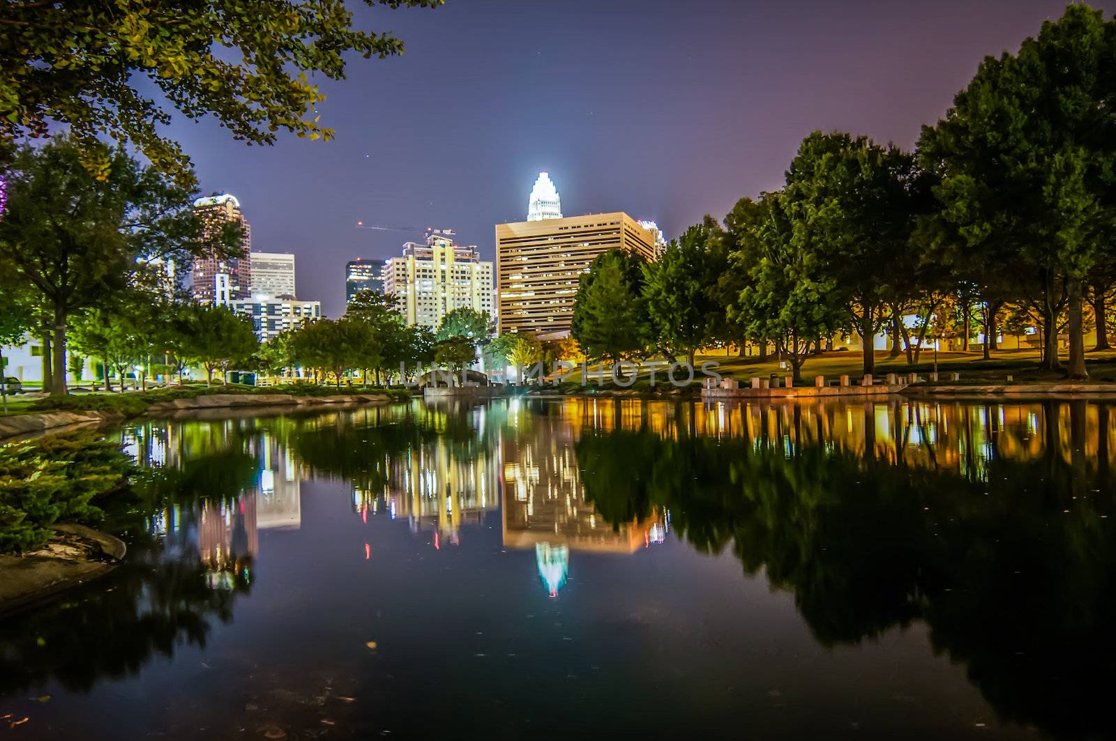 Charlotte City Skyline and architecture at night with reflections