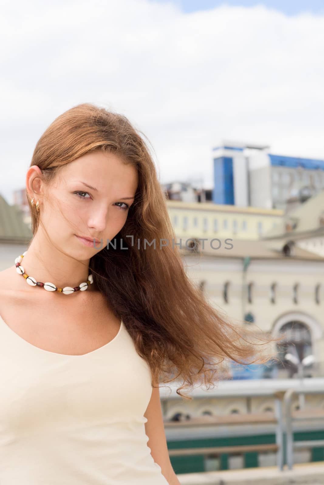 Cheerful girl looking at camera. 
