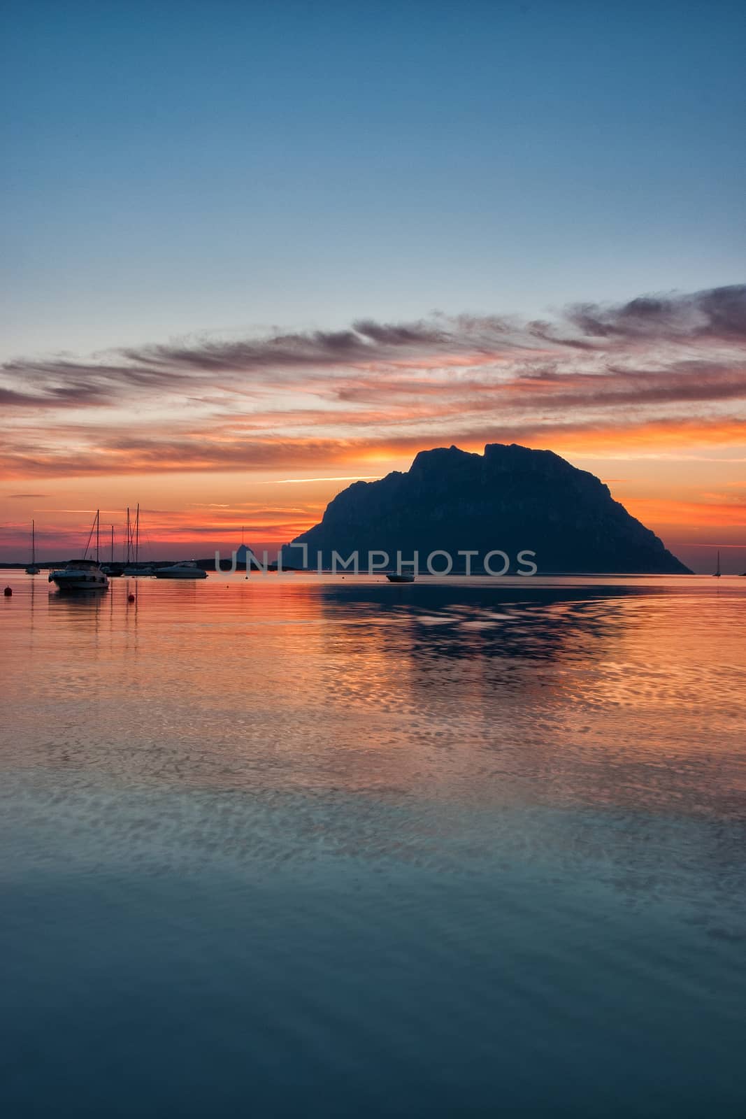 Famous Tavolara island at sunset on the Sardinia in Italy