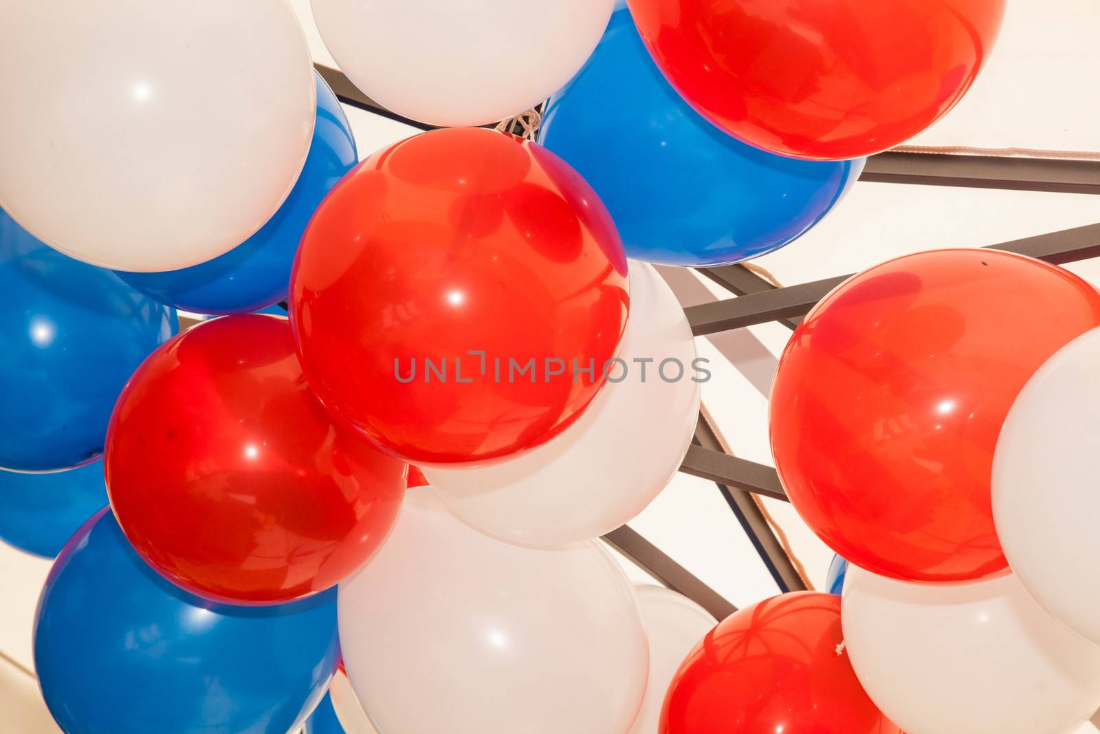 Blue White And Red Balloon decorations at party.
