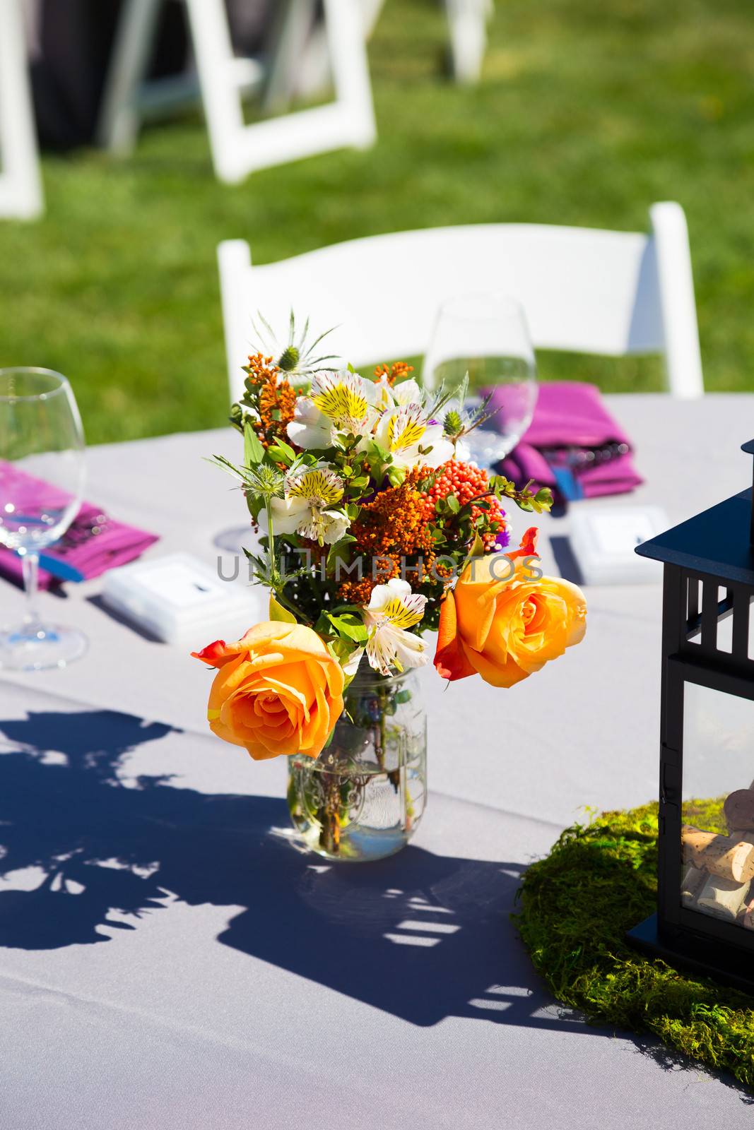 Tables, chairs, decor, and decorations at a wedding reception at an outdoor venue vineyard winery in oregon.