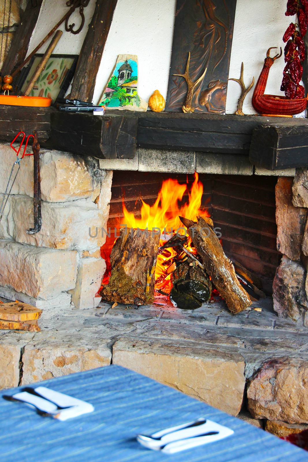 Cosy fireplace in a holiday lodge in Rila mountain, Bulgaria