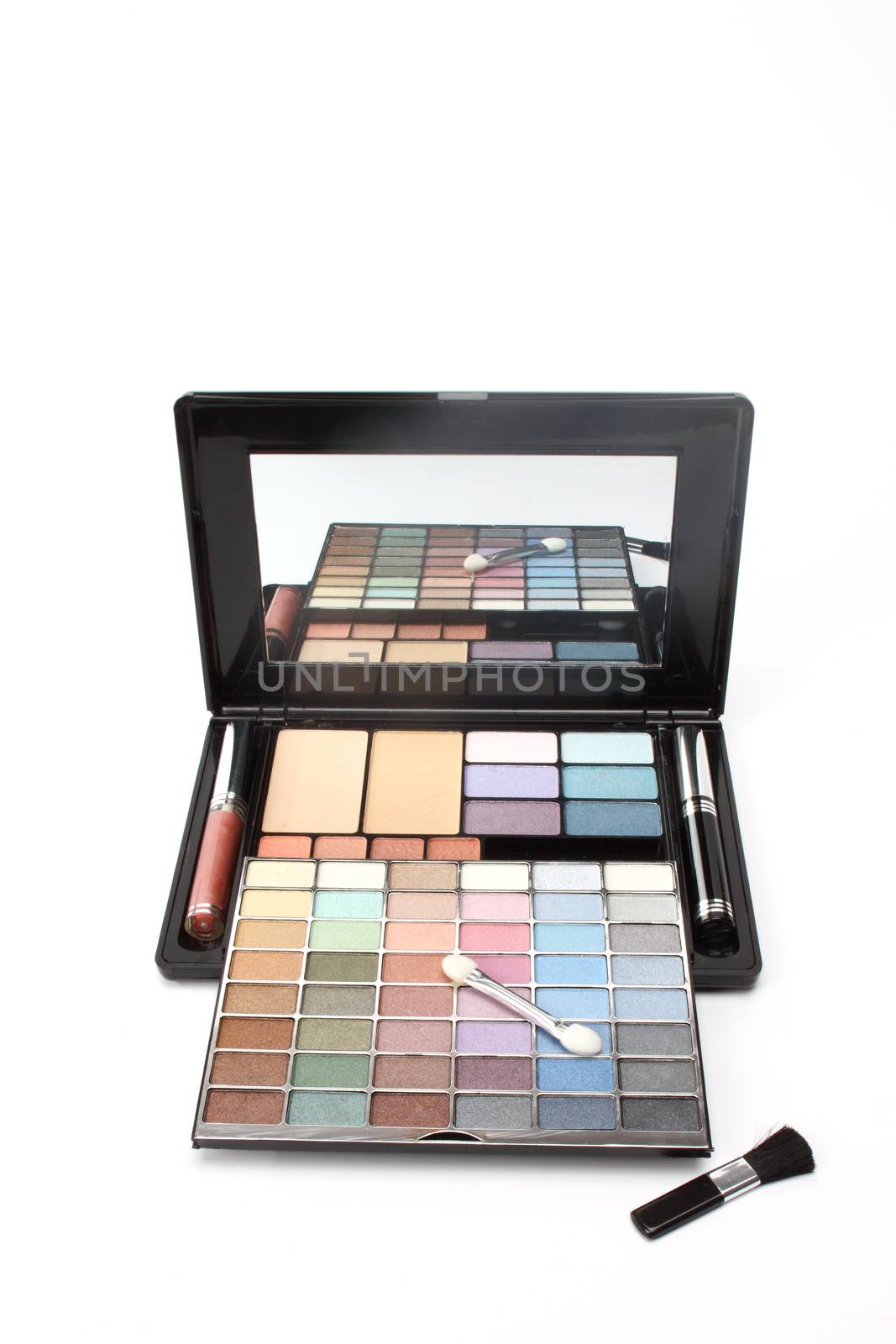 Multi colored make-up palette on white background 