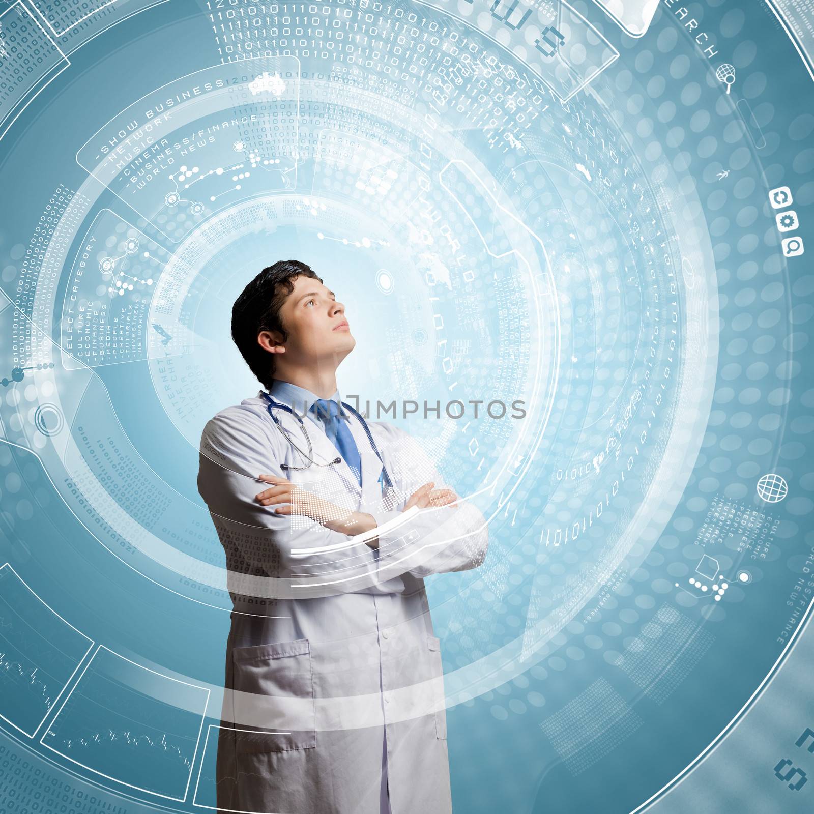 Young concentrated male doctor with arms crossed against digital background