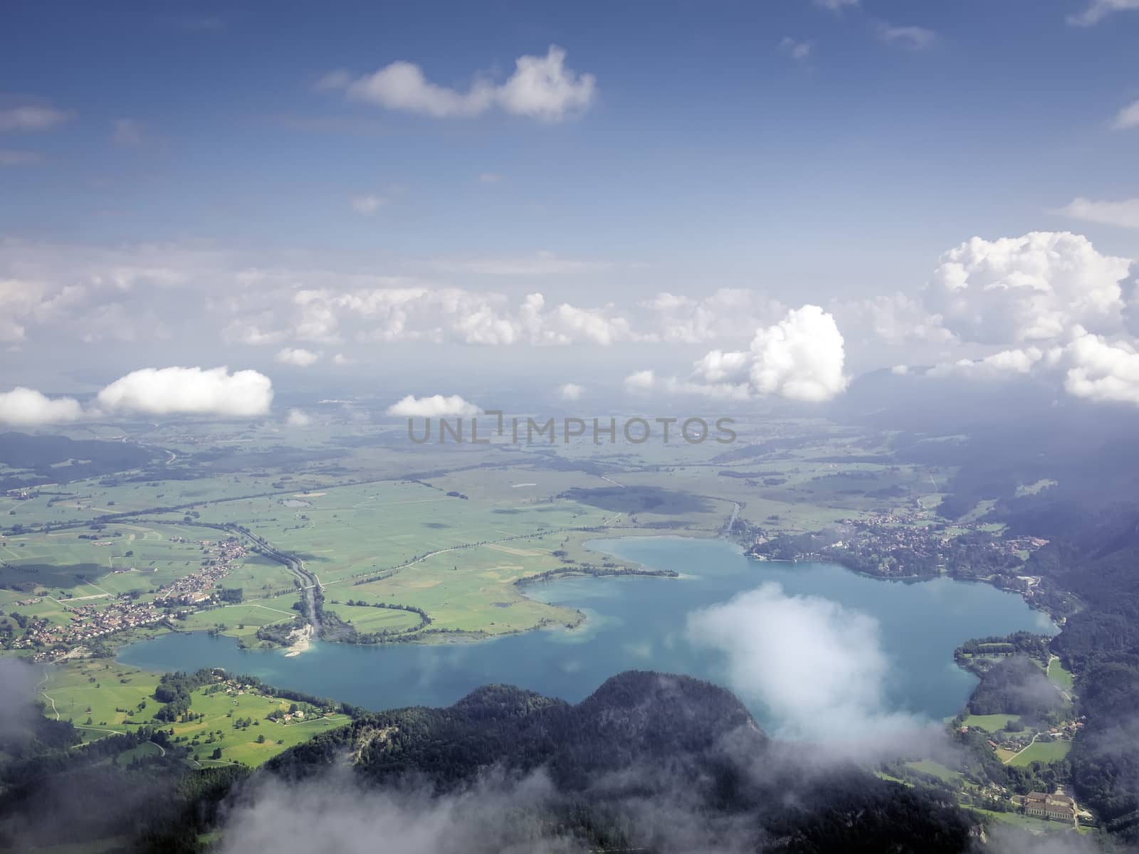 View from the top of the mountain Herzogstand in Germany Bavaria to the lake Kochelsee