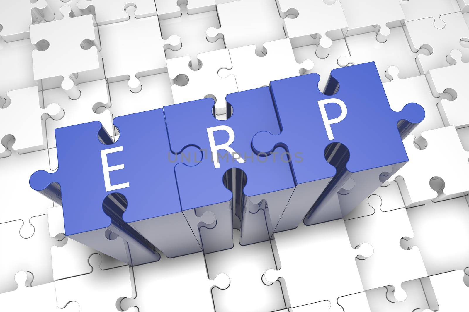 Puzzle concept: acronym ERP on blue jigsaw pieces