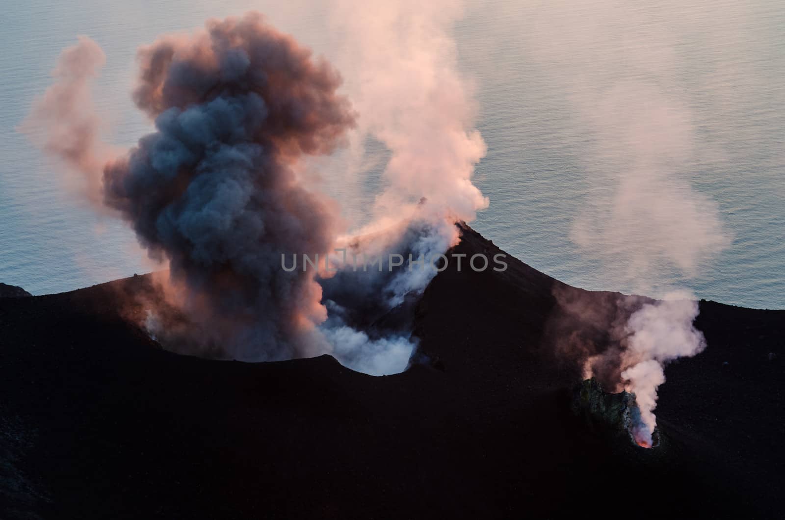 Smoking erupting volcano on Stromboli island, Sicily, Italy