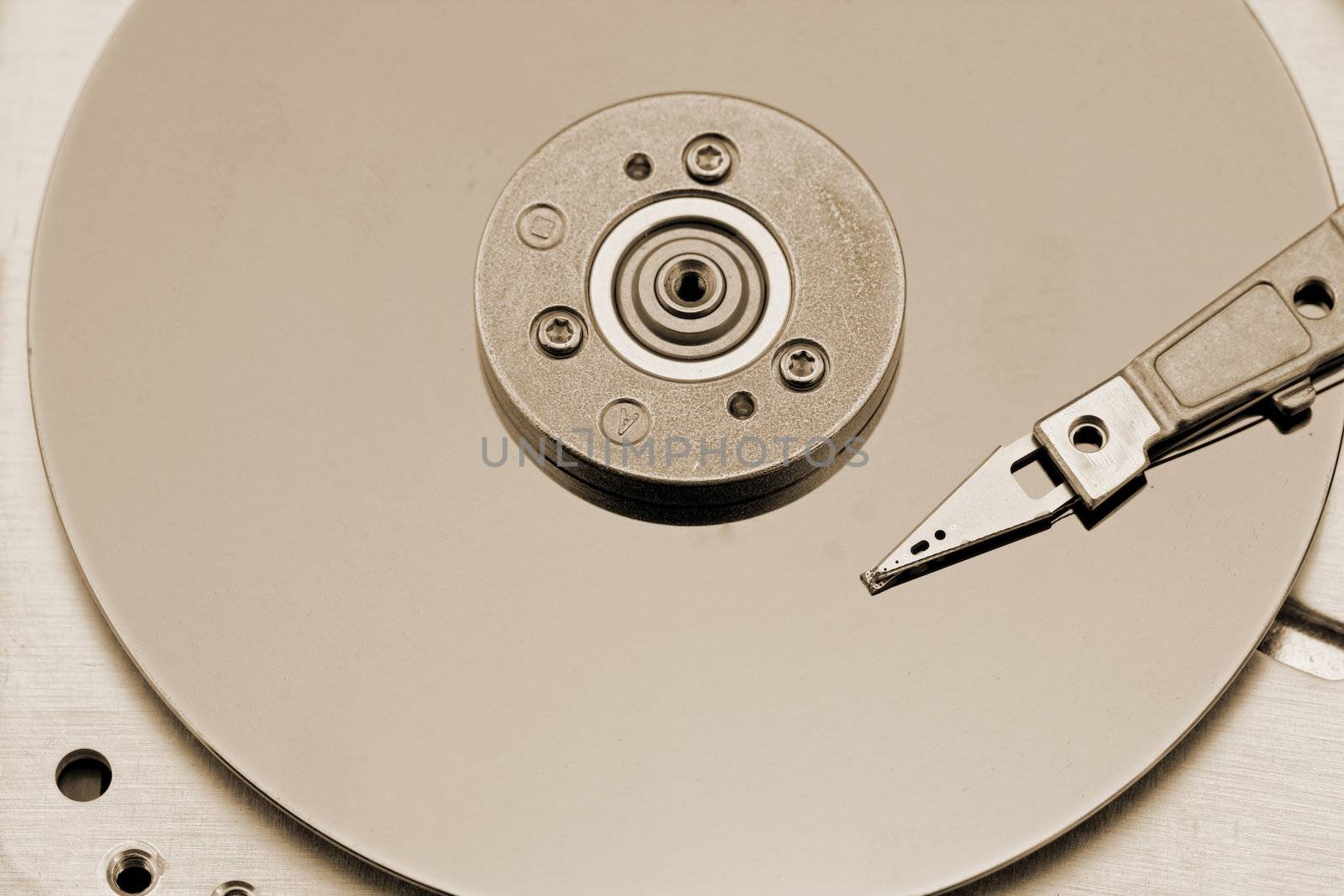 Open computer hard drive on white background with rusty color (HDD, Winchester)