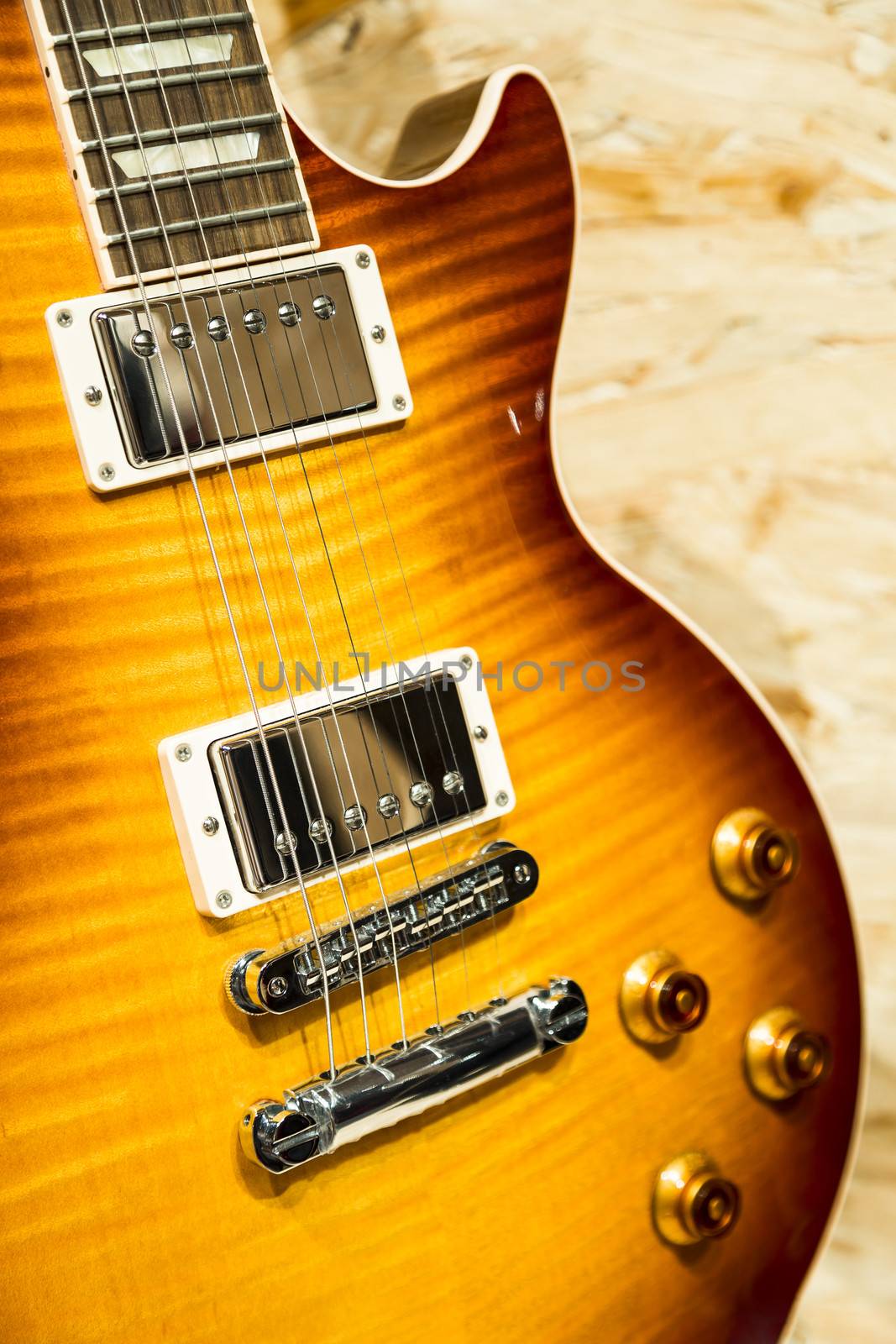 A close up vertical shot of a electric guitar