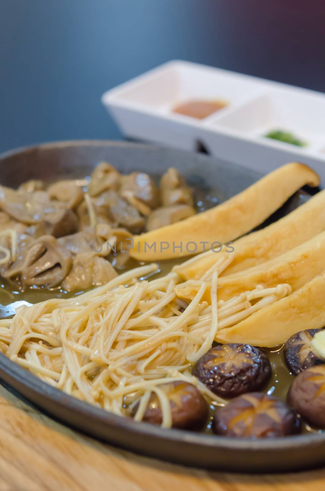 mixed  mushroom  stir fried on plate , healthy food