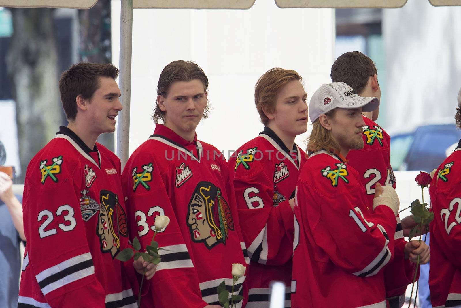 PORTLAND, OREGON - MAY 14: Portland Winterhawks Ice Hockey Team members presented with Rose at Pioneer Courthouse  on May 14, 2013, after winning the Western Hockey League Championship and bringing home the Ed Chynoweth Cup