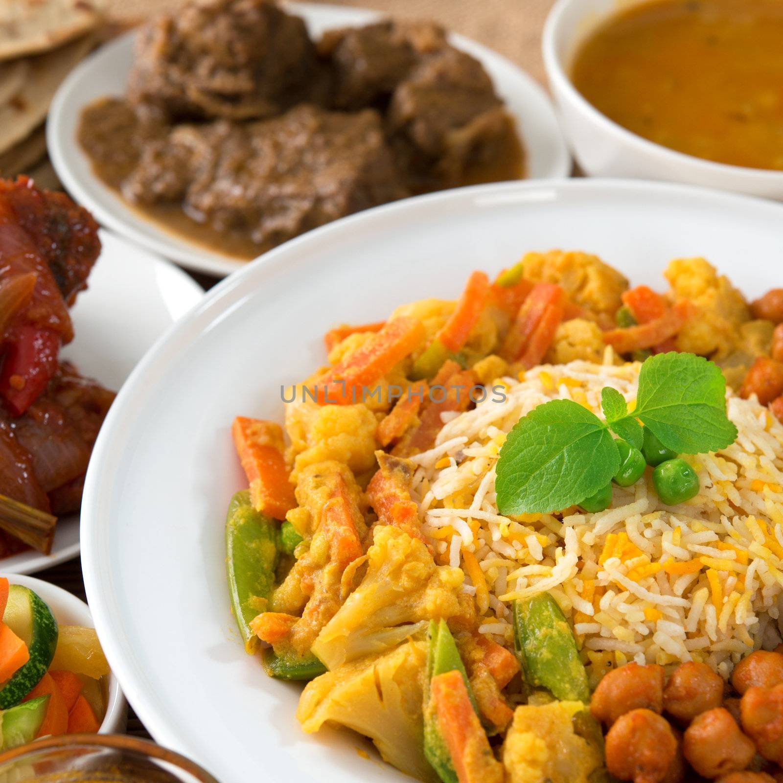 Indian cuisine biryani rice and curry.