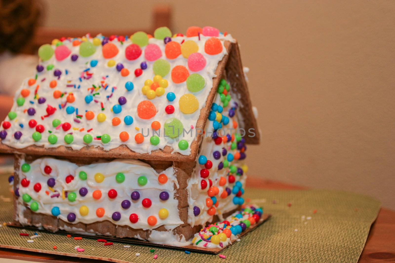 Making gingerbread house together at home before Christmas.