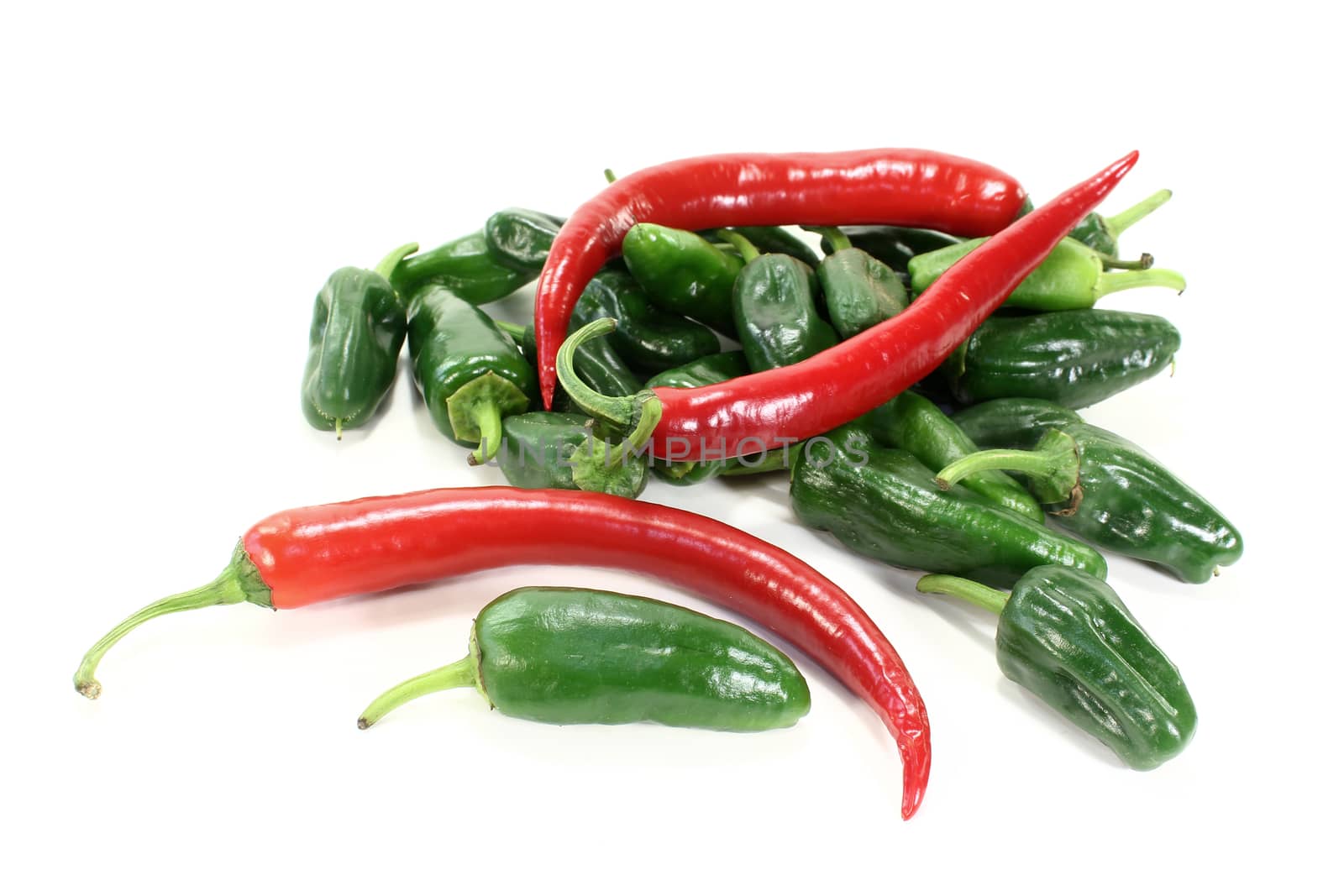 Pimientos with hot peppers on a light background