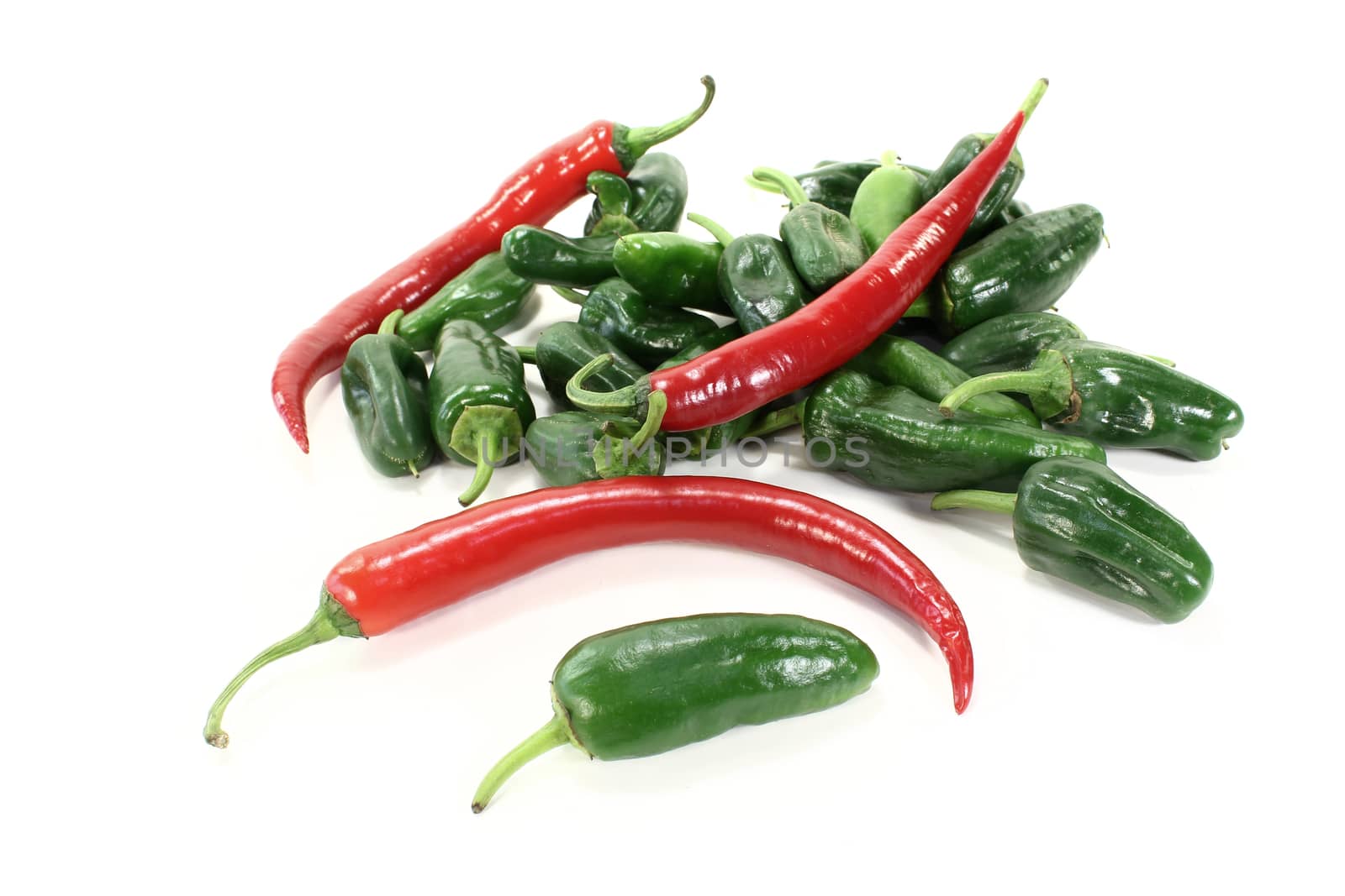 Pimientos with red hot peppers on a light background