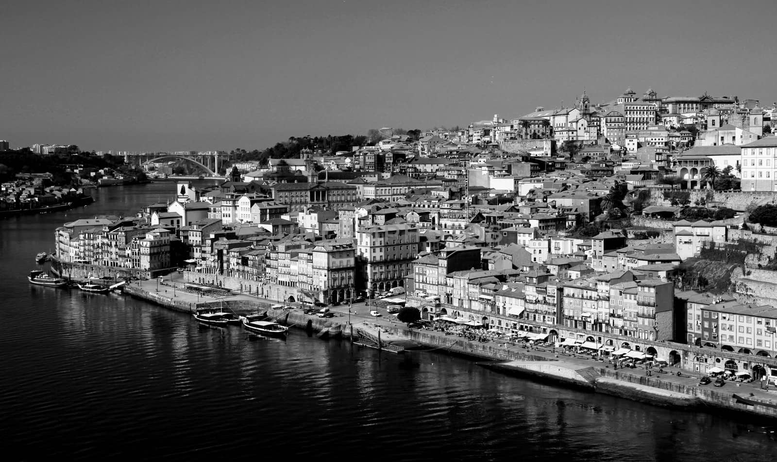 Portugal. Porto city. View of Douro river embankment in the morning  in black and white