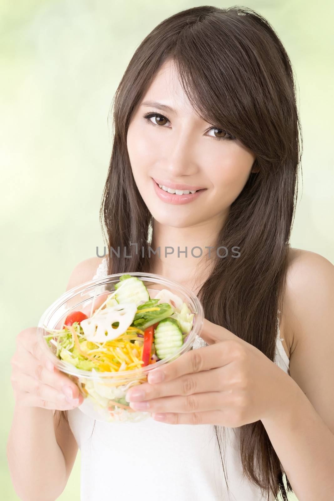 Asian beauty eat salad, closeup portrait.