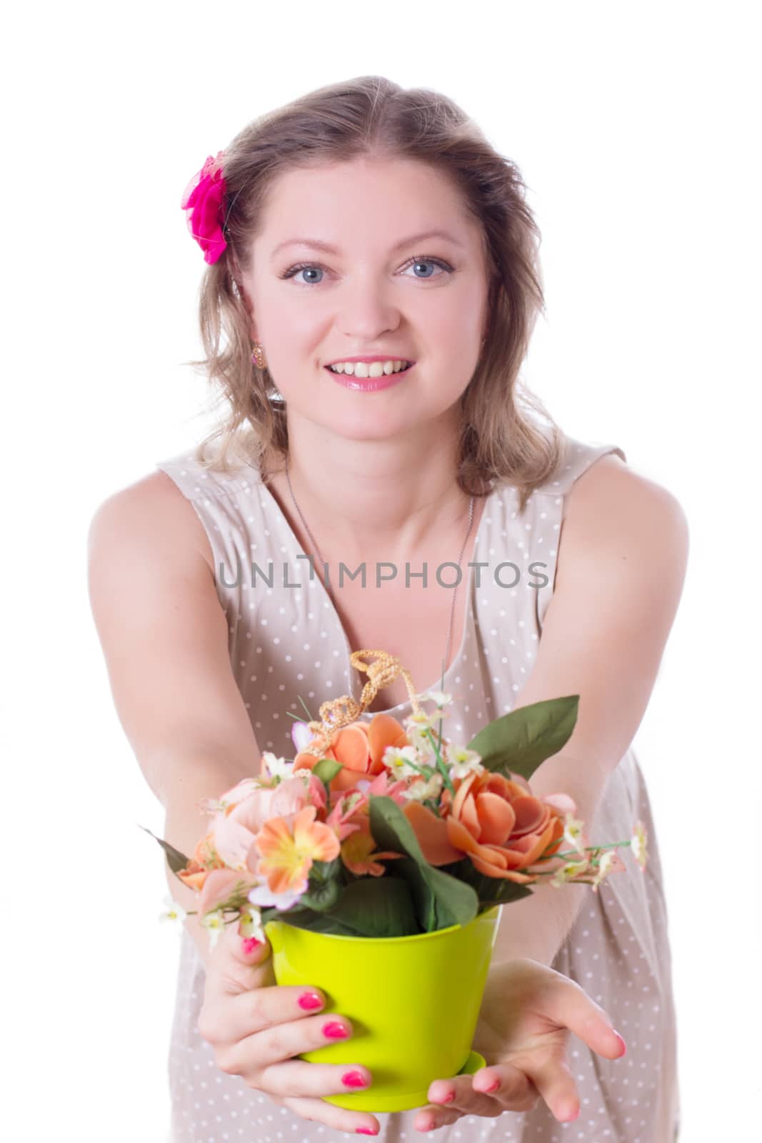 Woman offering flowers in pot isolated over white