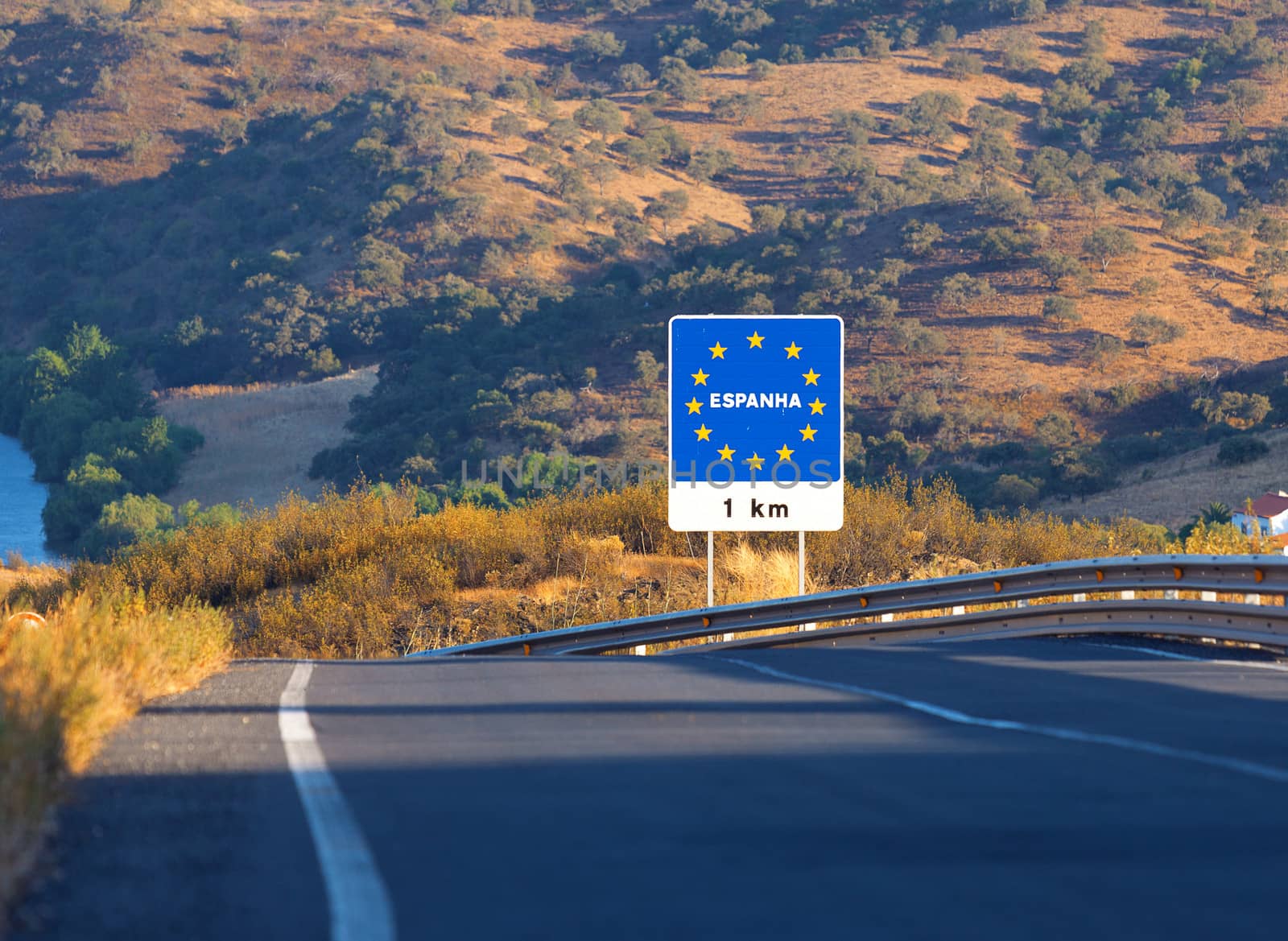 Road sign on the border, Spain by Discovod