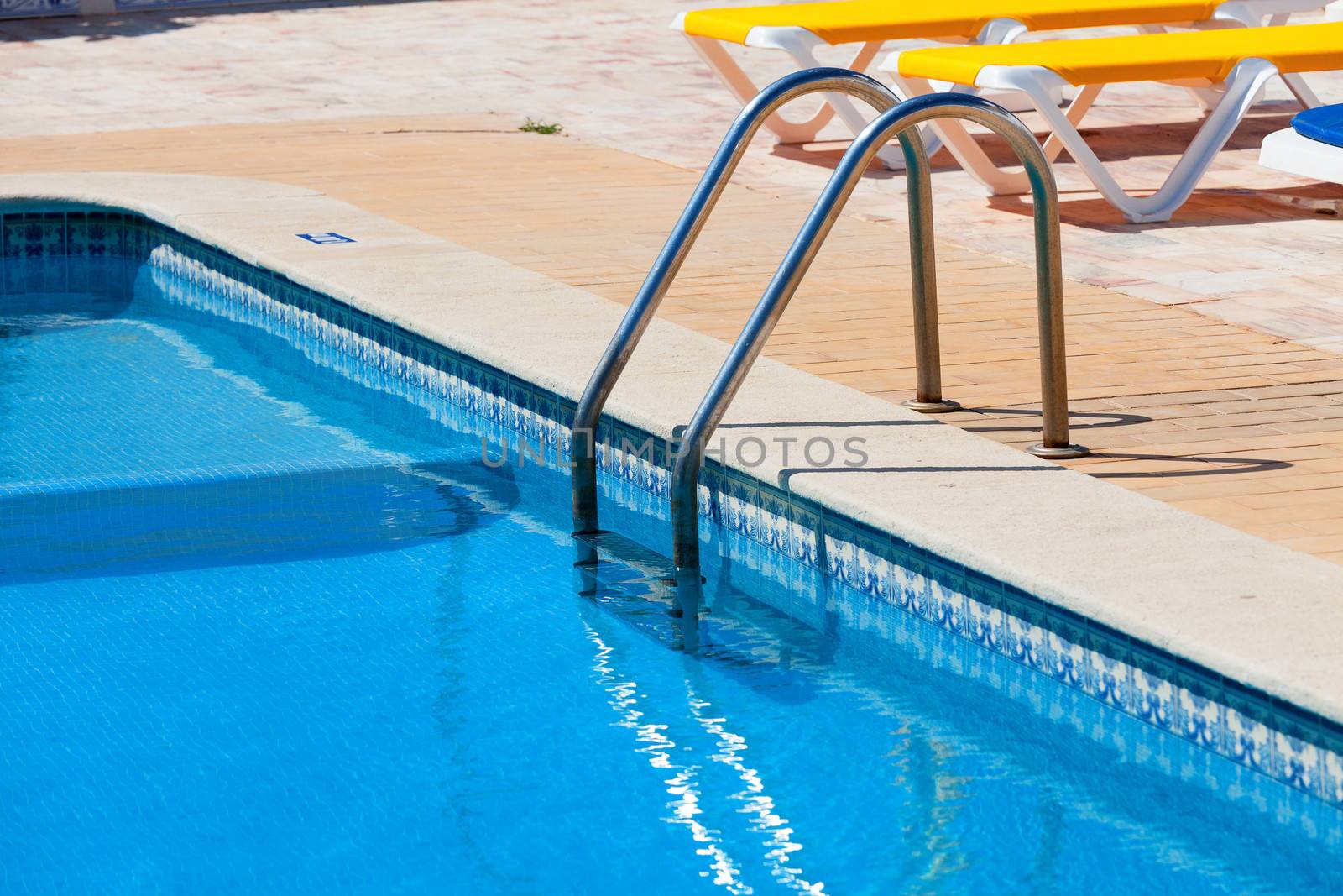 Ladder in the swimming pool, closeup