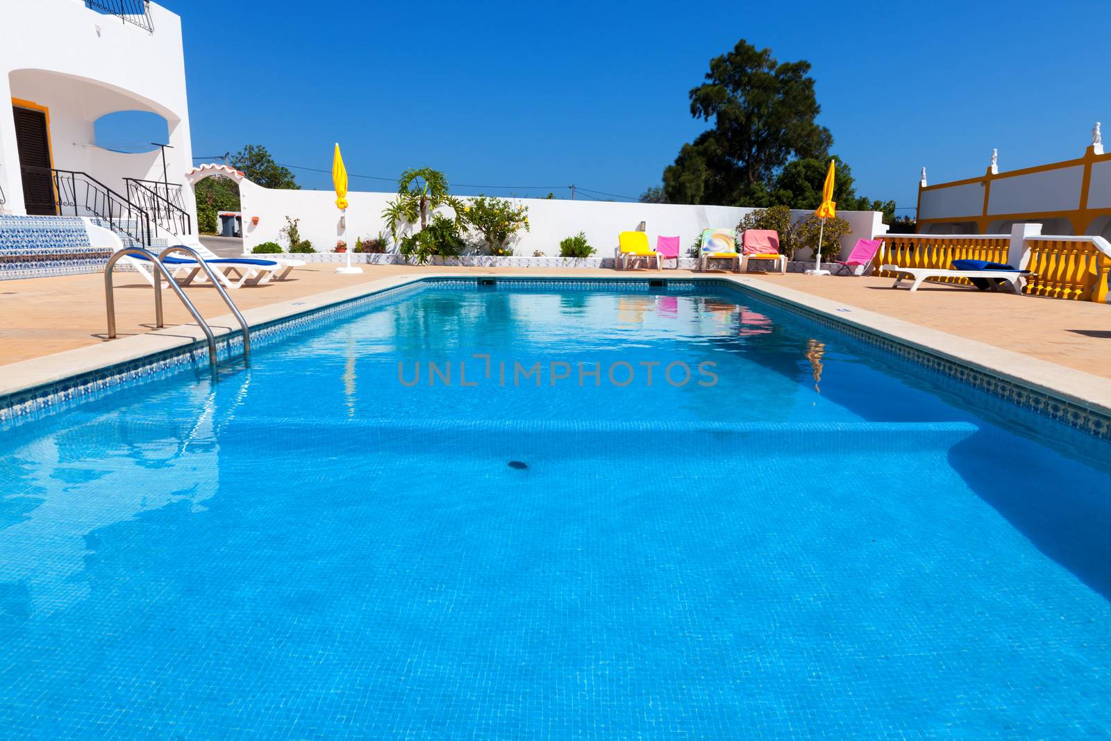 Beautiful swimming pool in hotel in sunny day