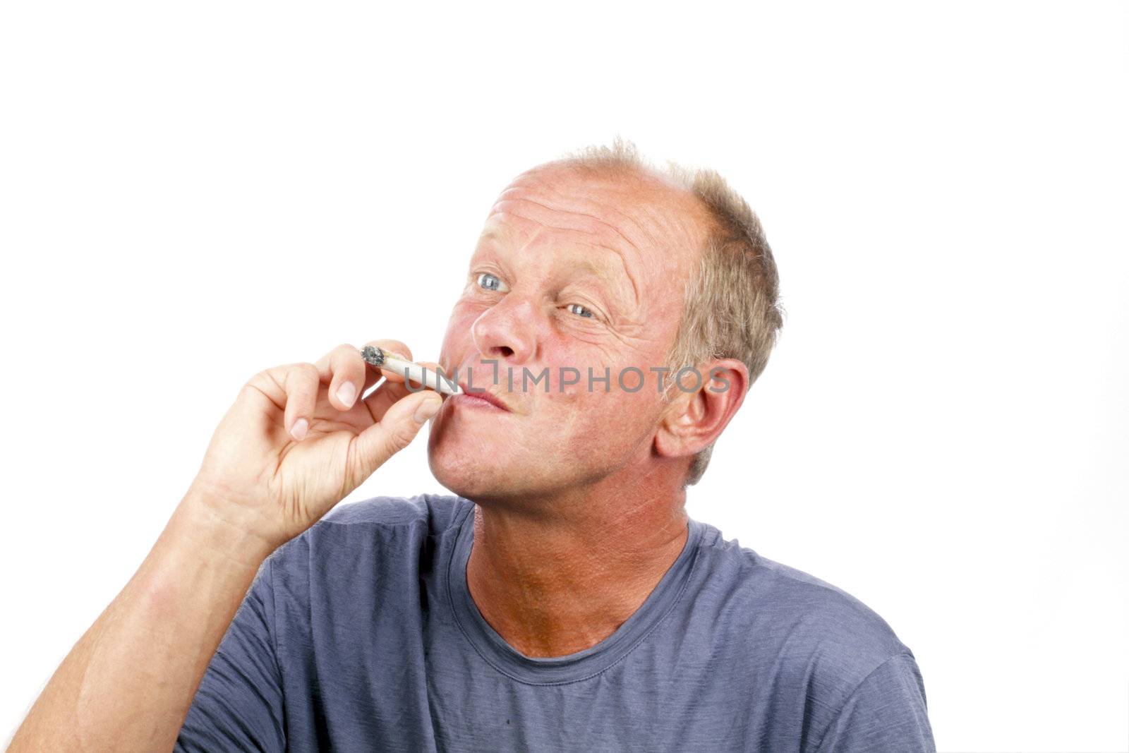 Man smoking a marihuana joint