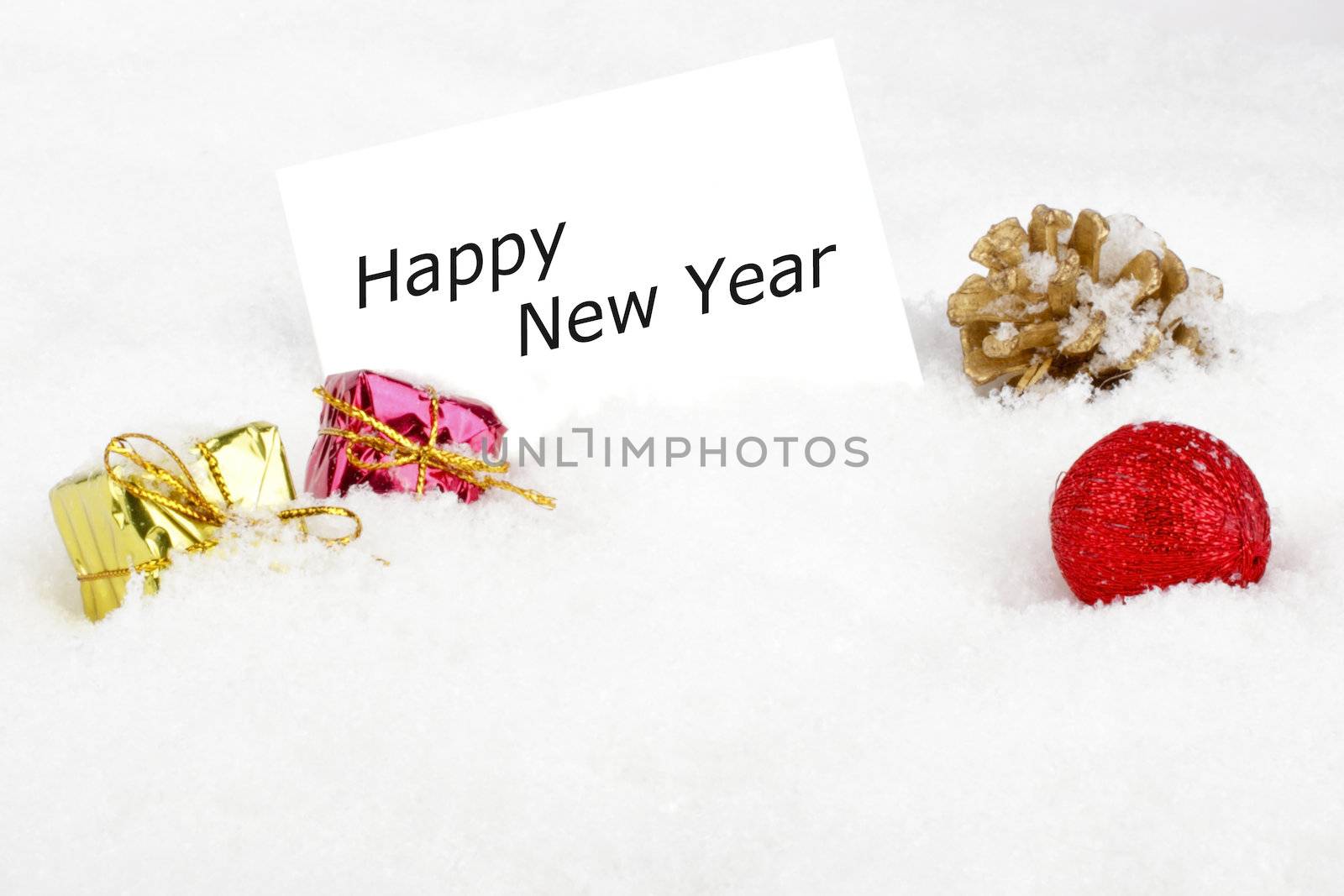 Blank white card with christmas decoration in the snow