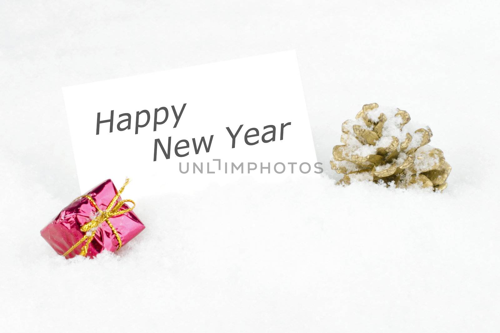 Blank white card with christmas decoration in the snow