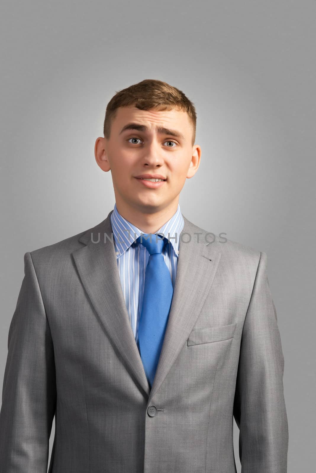 Portrait of sad businessman looking into the camera