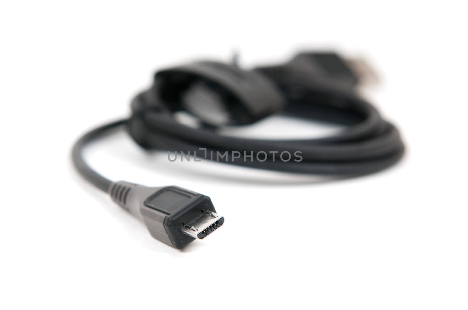 usb to micro-usb cable isolated on white background by lexan