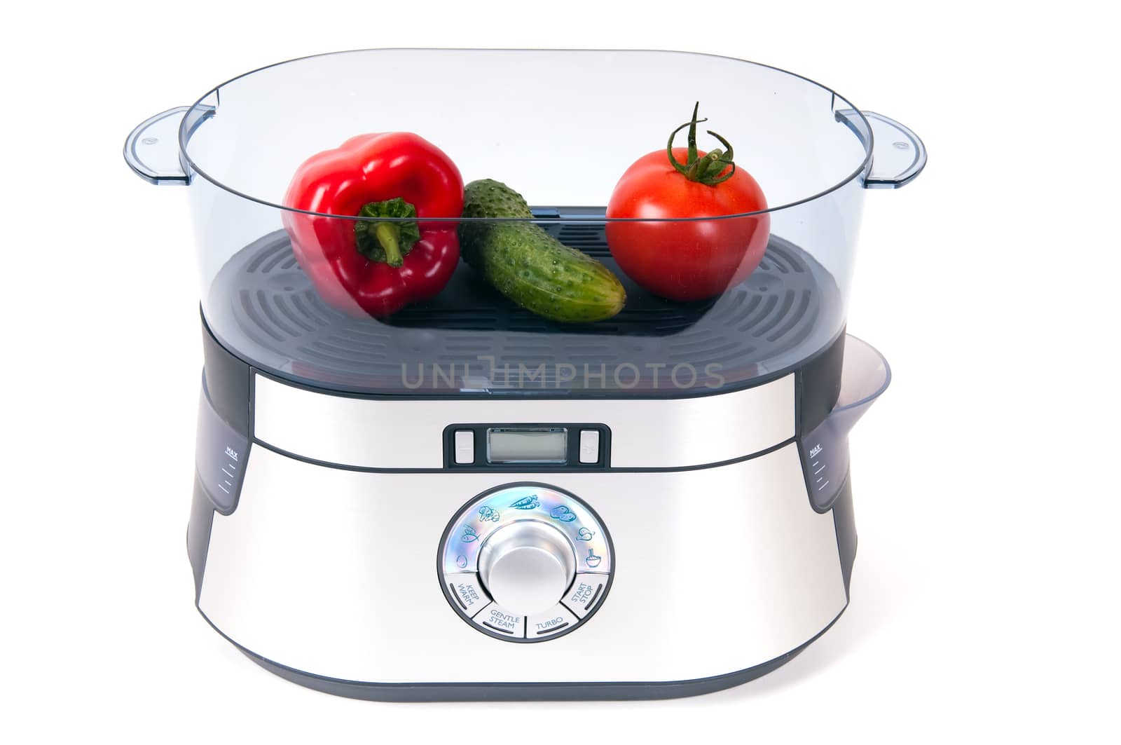 modern electric steamer with fresh vegetables on a white background 