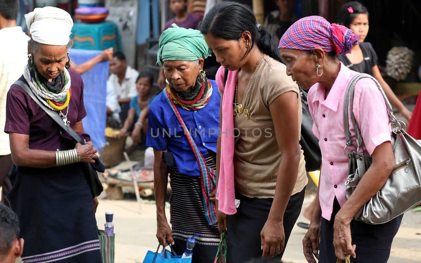 Indigenous Reang (Bru) women at the border market between Tripura and Mizoram states in NE India. May 29, 2012. The Reang or Bru community lives on both sides of the border and is object of disputes between both states.