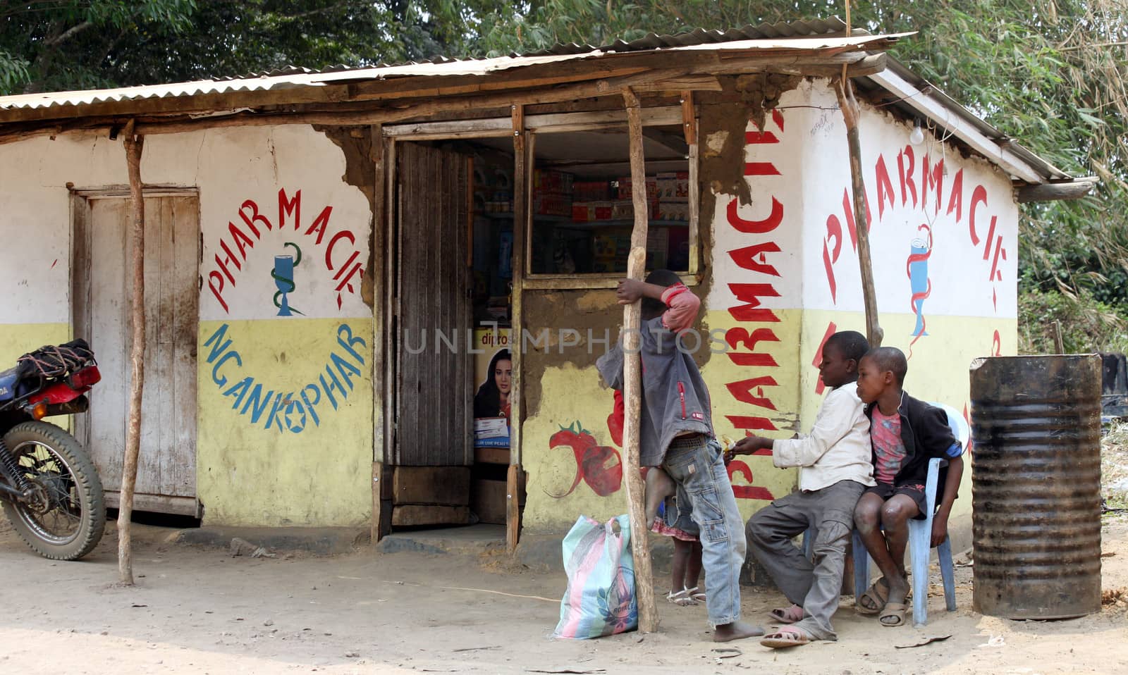 Village pharmacy in DR Congo. Kinshasa Province, Plateau de Bateke, road N1. August 25, 2010. Small retail shops like this are still the main source of medical service in rural areas of Congo. Often the quality of drugs is questionable.
