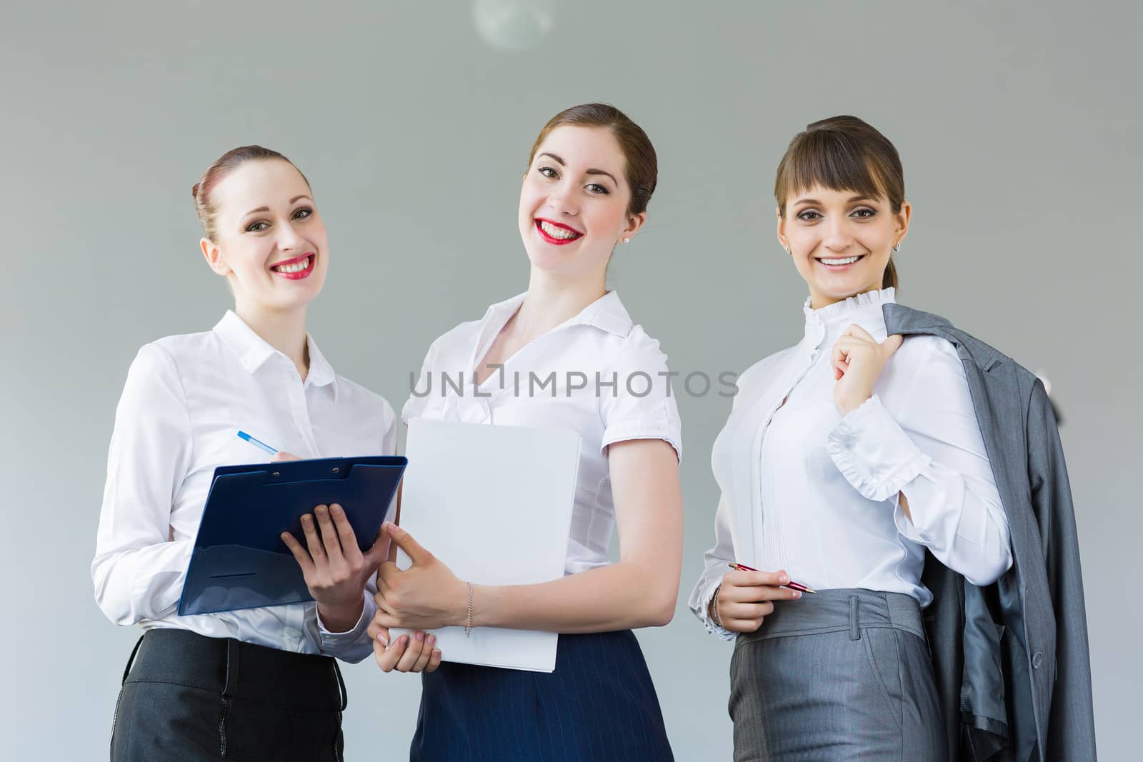 Three young businesswomen by sergey_nivens