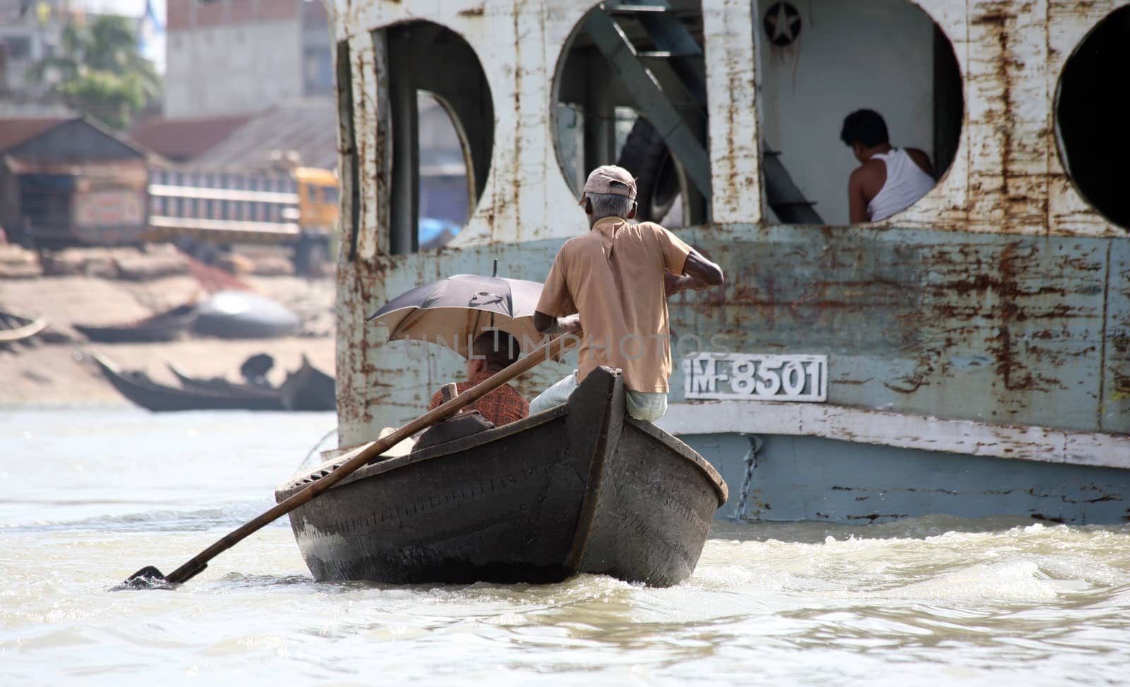 Busy river traffic on Buriganga in Dhaka, capital of Bangladesh. July 9, 2010. The strongly polluted arm of the Padma river in the Ganges-Brahmaputra river delta is an economically important arteria for the city.