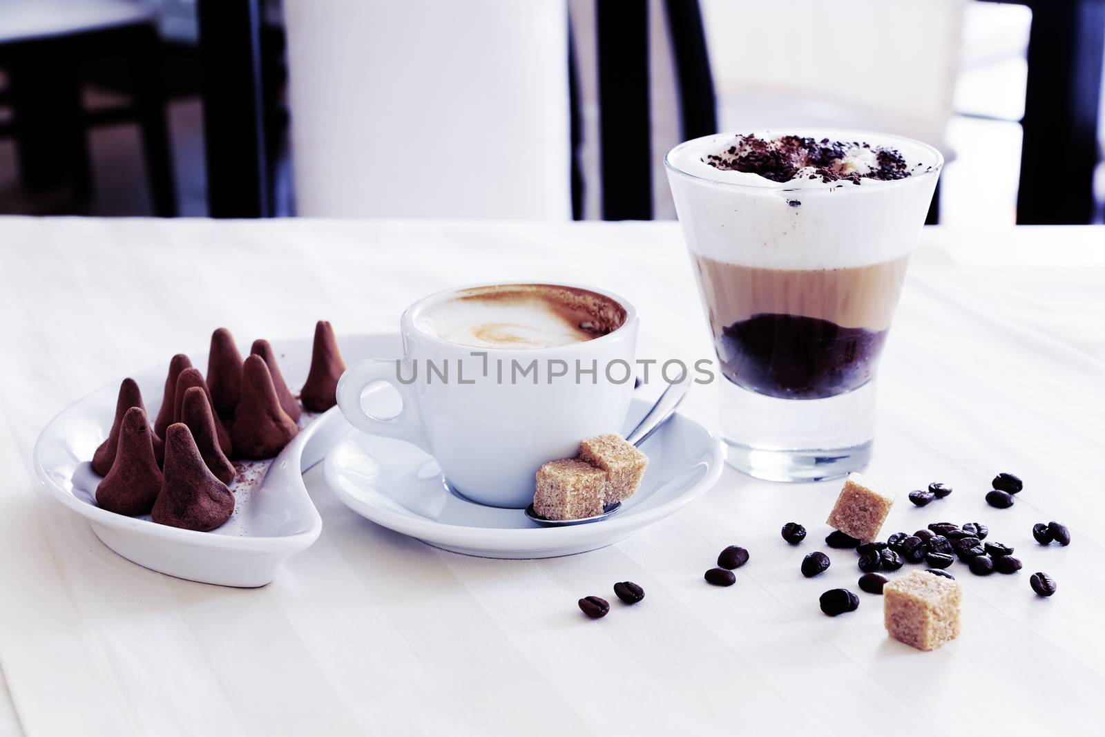 coffee and delicious chocolates on the table