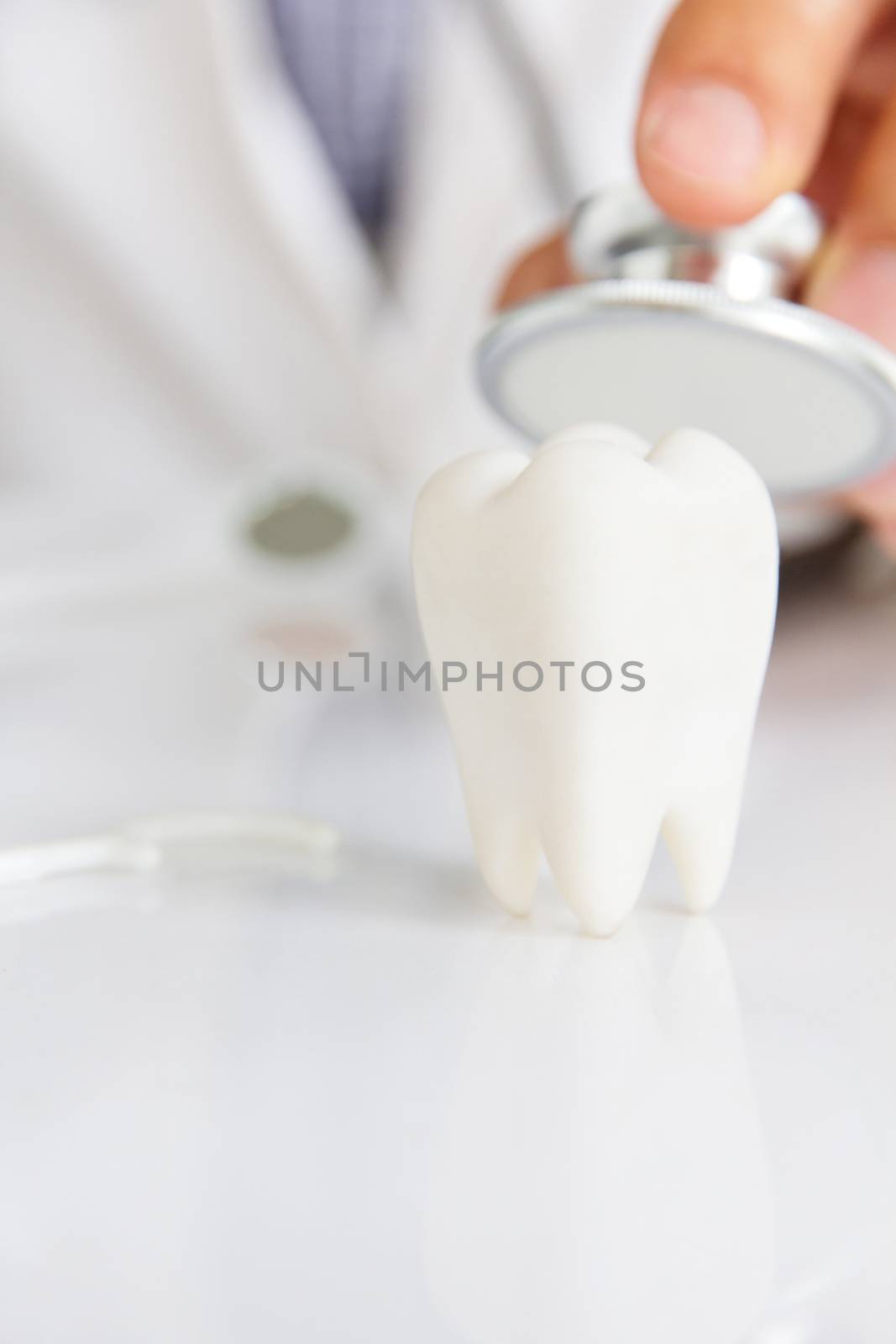 molar with dentist background ,dental concept