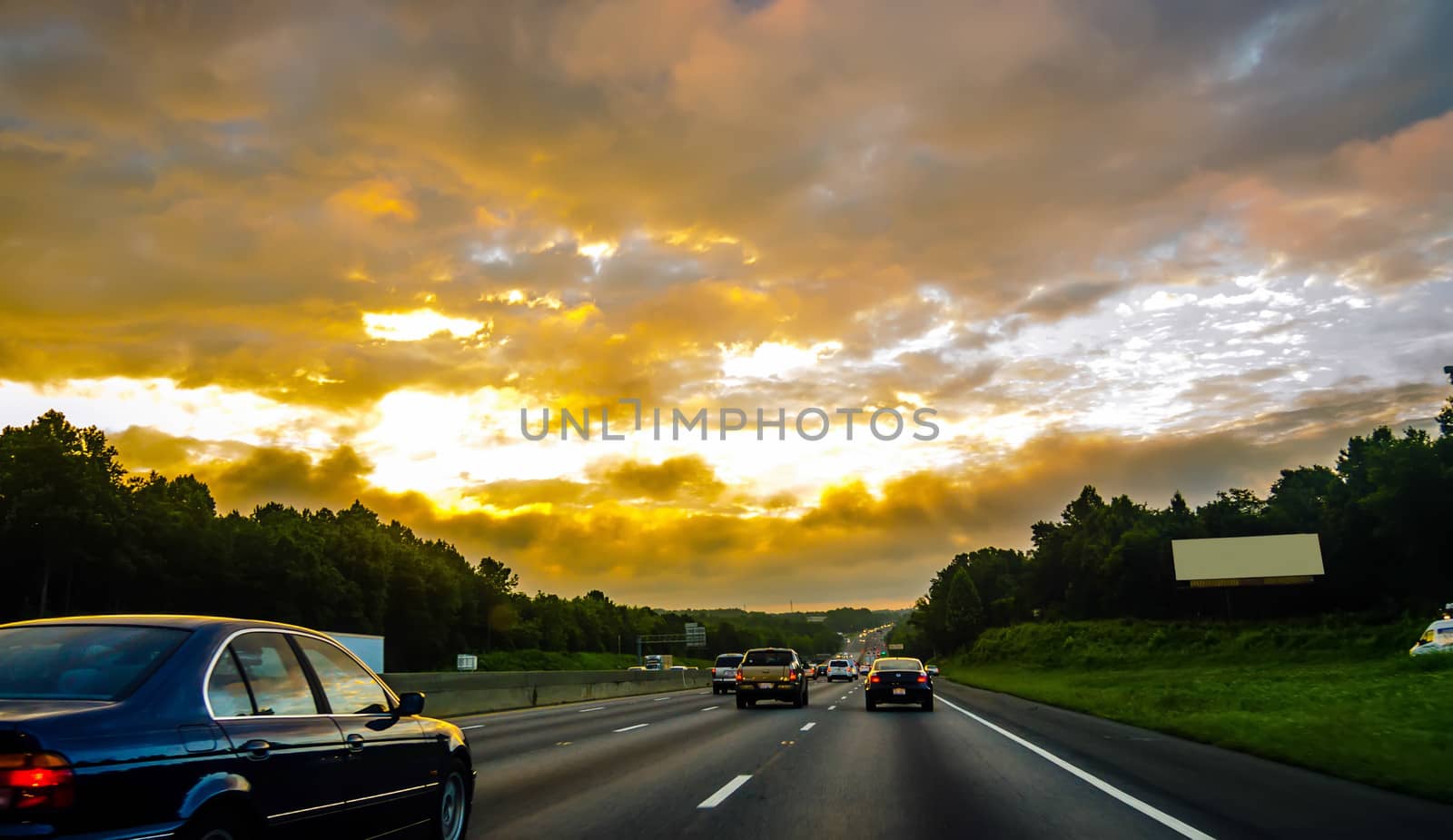 dramatic beautiful surise while driving on highway