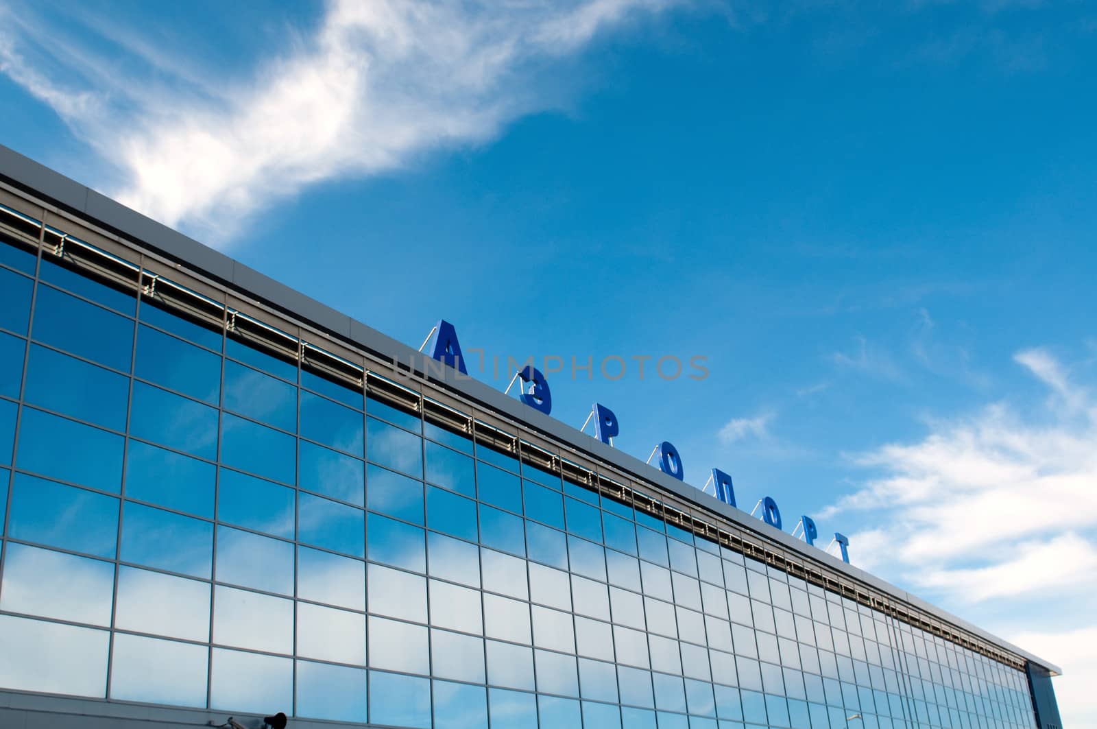 The modern russian airport with airplane over it