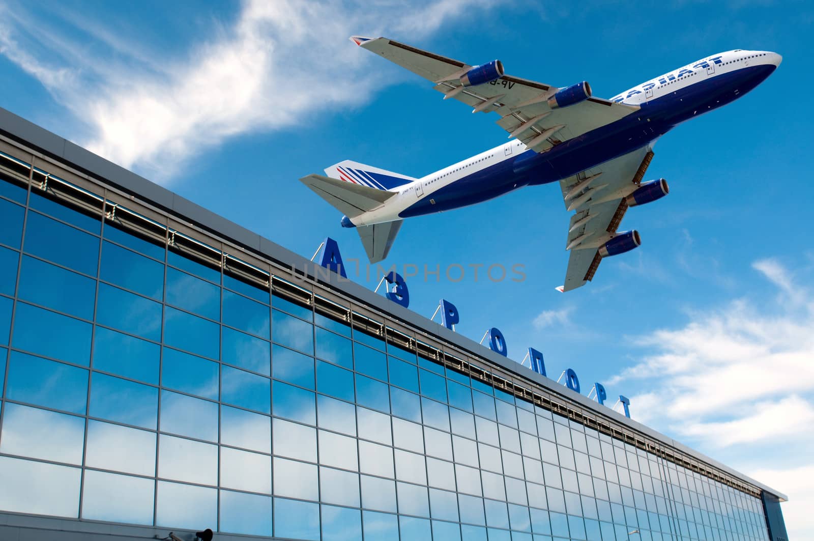The modern russian airport with airplane over it
