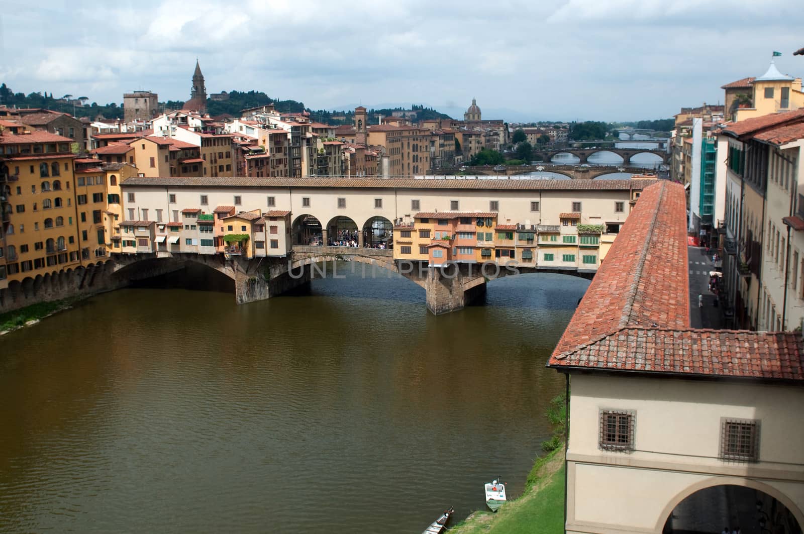 The Ponte Vecchio ("Old Bridge") is a Medieval bridge over the Arno River in Florence, Tuscany, Italy.