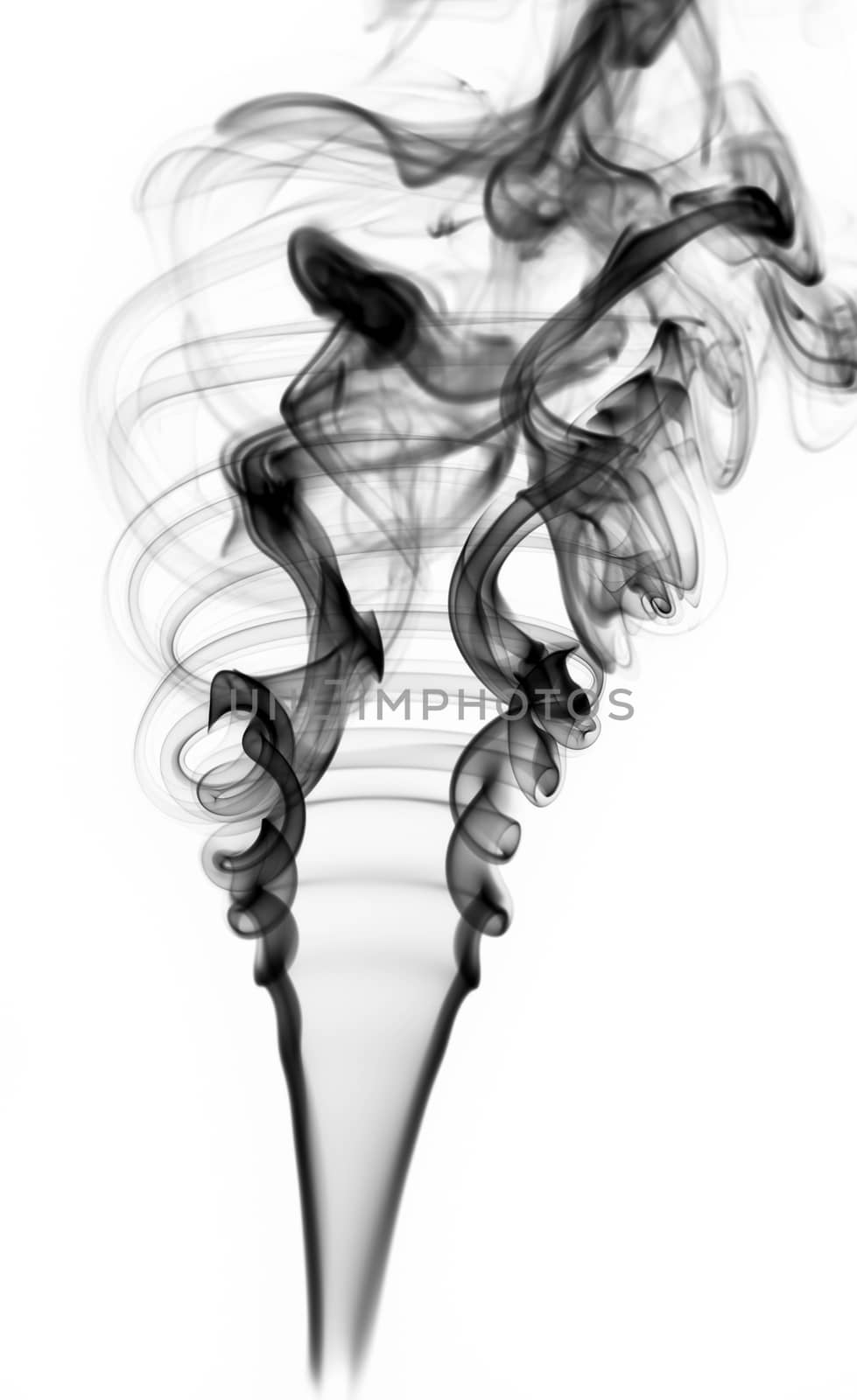 Abstract black smoke swirls over white background