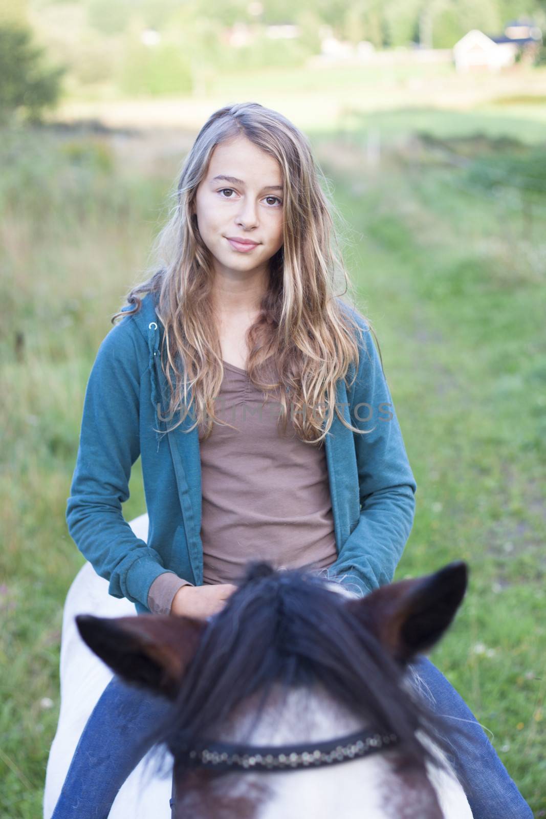 A teenager bareback on an icelandic horse