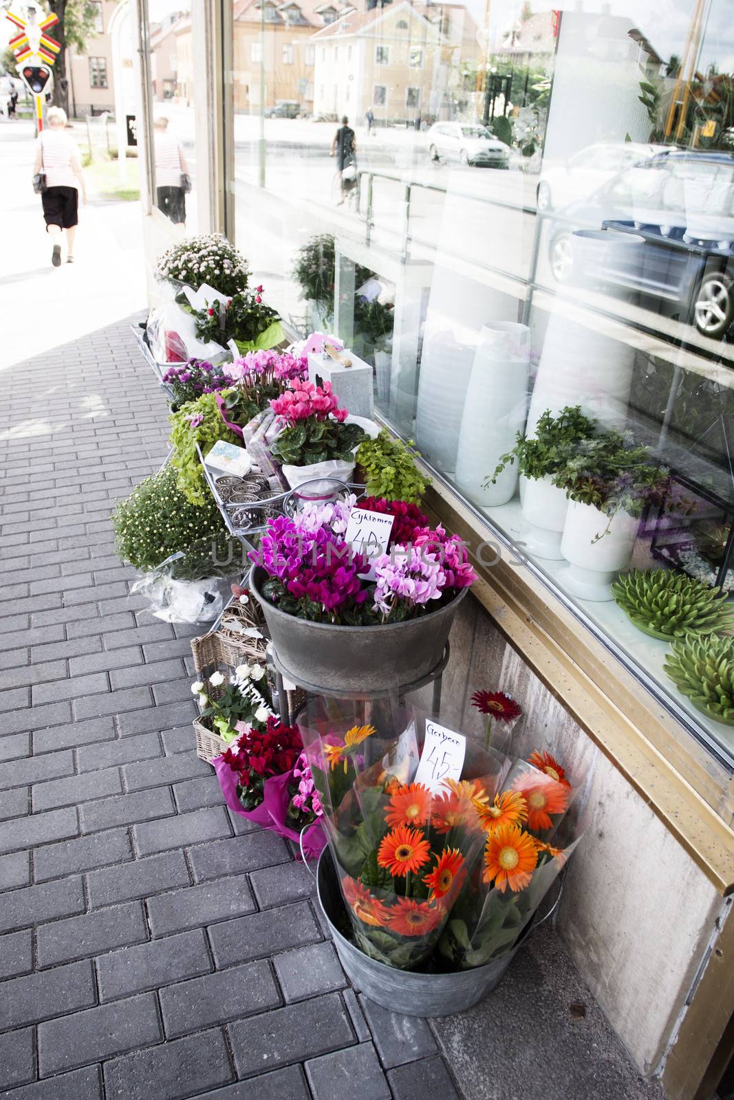 Flowers for sale on the street outside a shop in Sweden