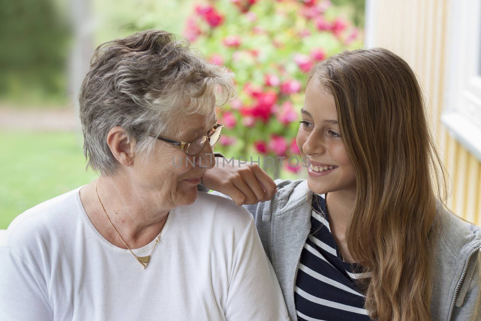 Grandmother and grandchild looking at each other