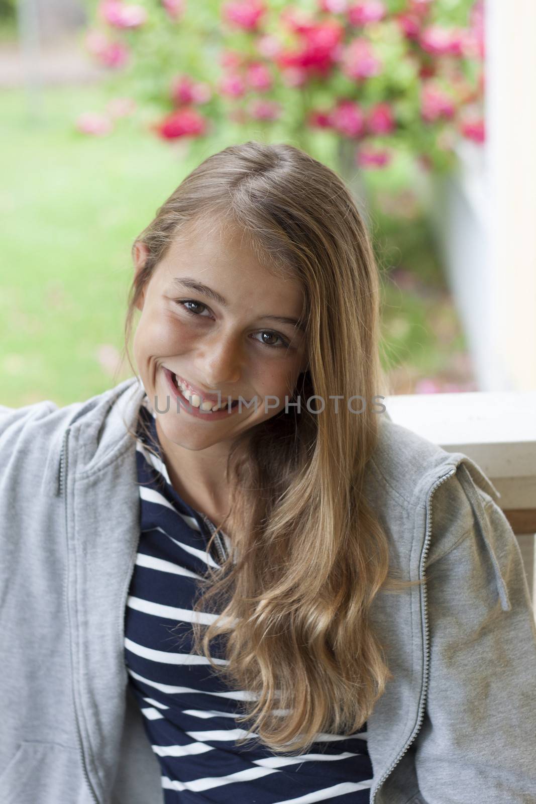 A confident modern and relaxed teen laughing out loud