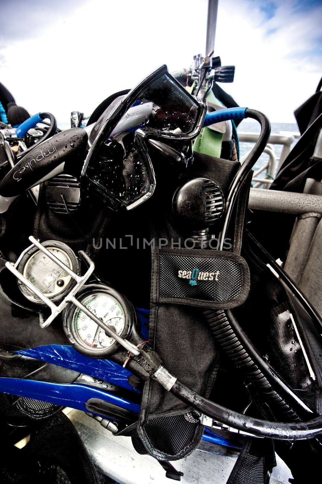 Close up shot of a face mask and other scuba diving equipment.