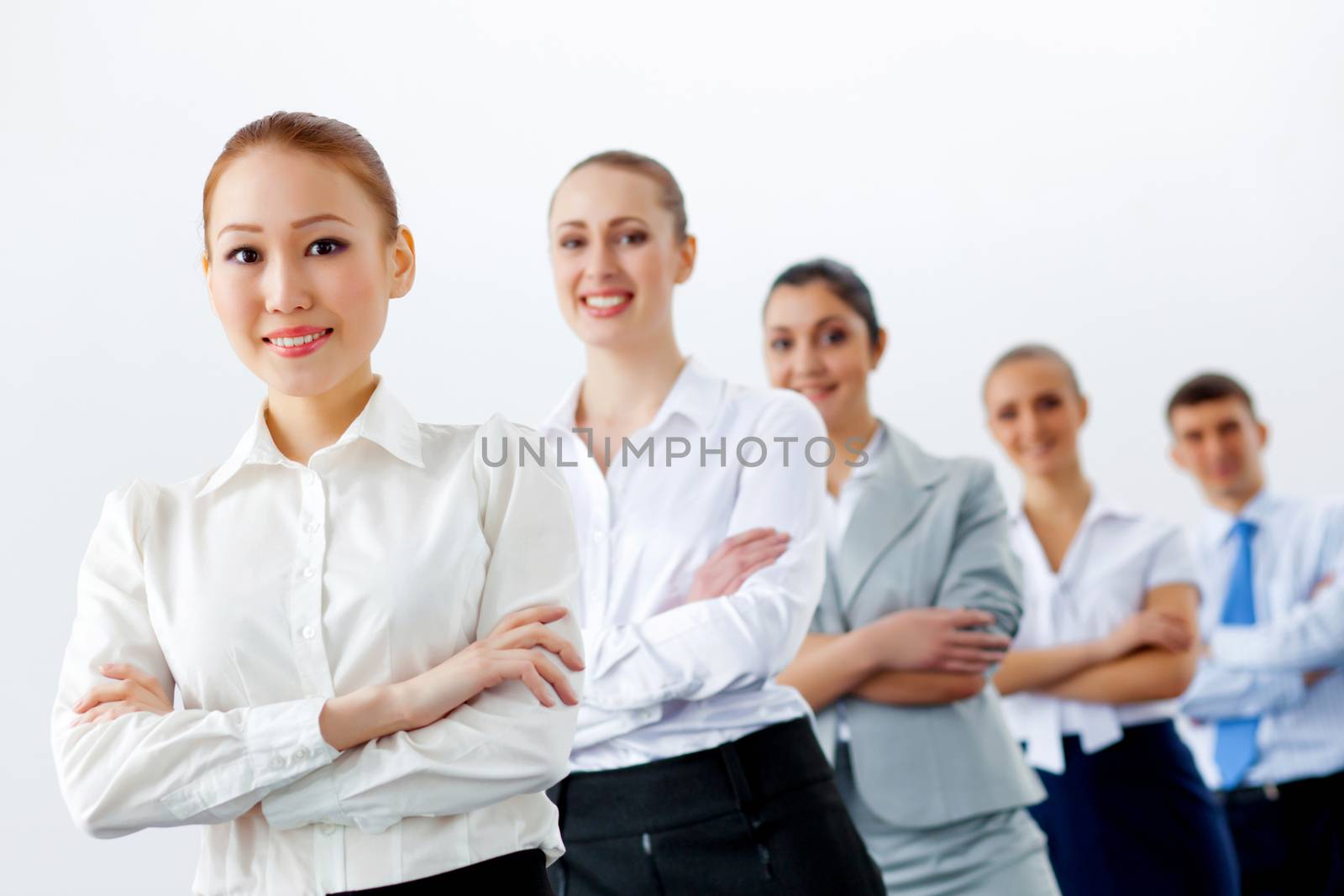 Group of business people standing in row by sergey_nivens